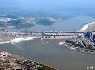 This photo taken on Tuesday, June 3, 2003 shows the Three Gorges Reservoir on the middle reaches of the Yangtze River at Yichang, Hubei province. The water level reached, as planned, 114.29 meters high on the sluice gate at Tuesday. (AP Photo/ Xinhua, Cheng Min)