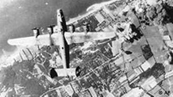 Aerial photo of bomber over German city