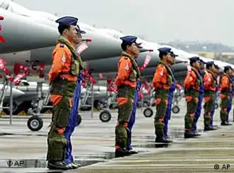 Taiwan Air Force pilots and ground crew stand beside Mirage 2000 fighter jets, Hsinchu Air Force Base, Taiwan