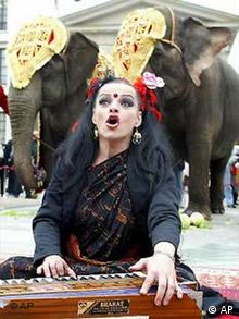 Nina's got a bent toward Hinduism - shown here with elephants and East Indian attire